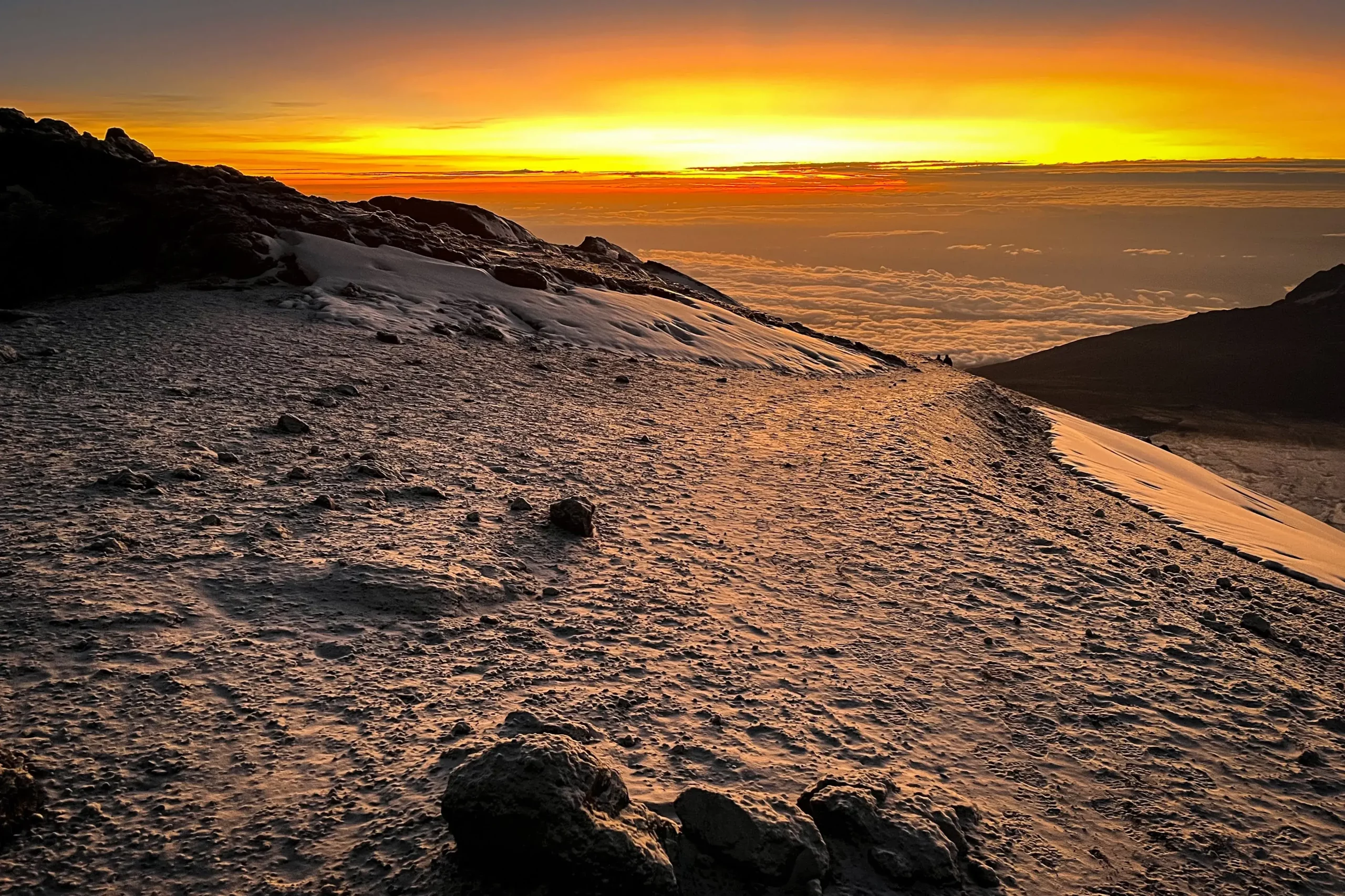 the magnificent view of sunset at Kilimanjaro peak after trekking for 5 days