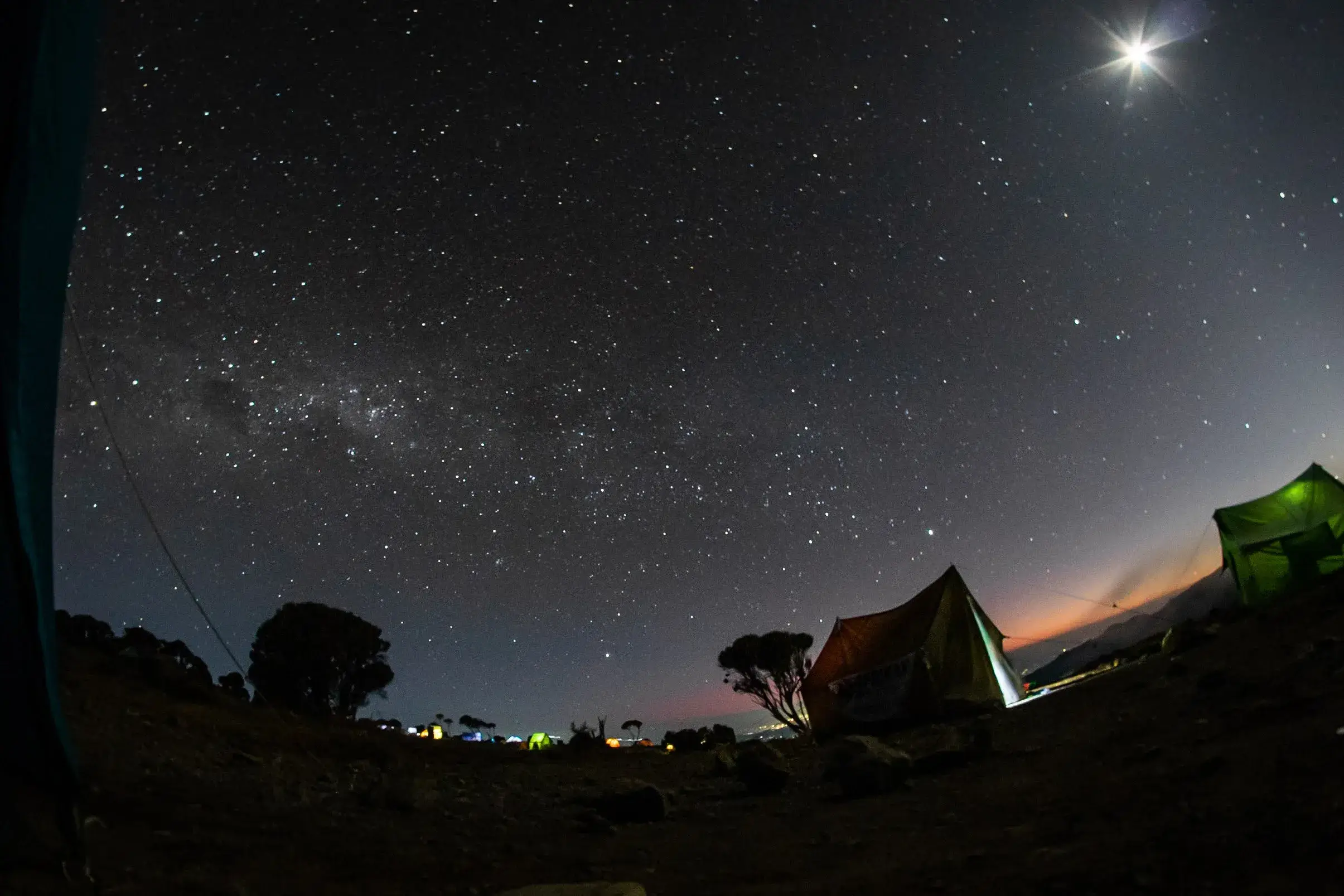 Night view of stars and Camping tents of afrikan adventures in treks.
