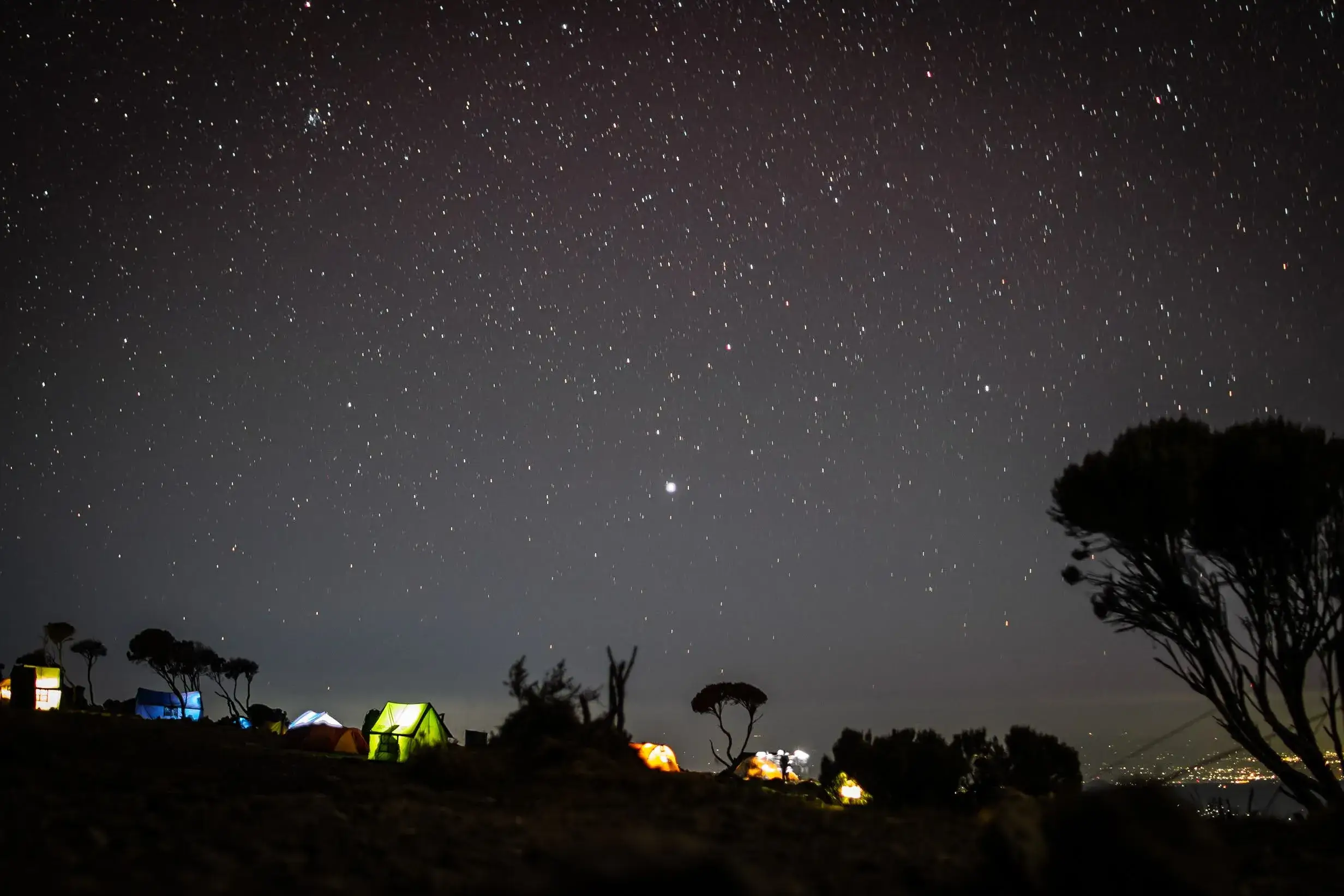 Night view of stars and Camping tents of afrikan adventures in treks.