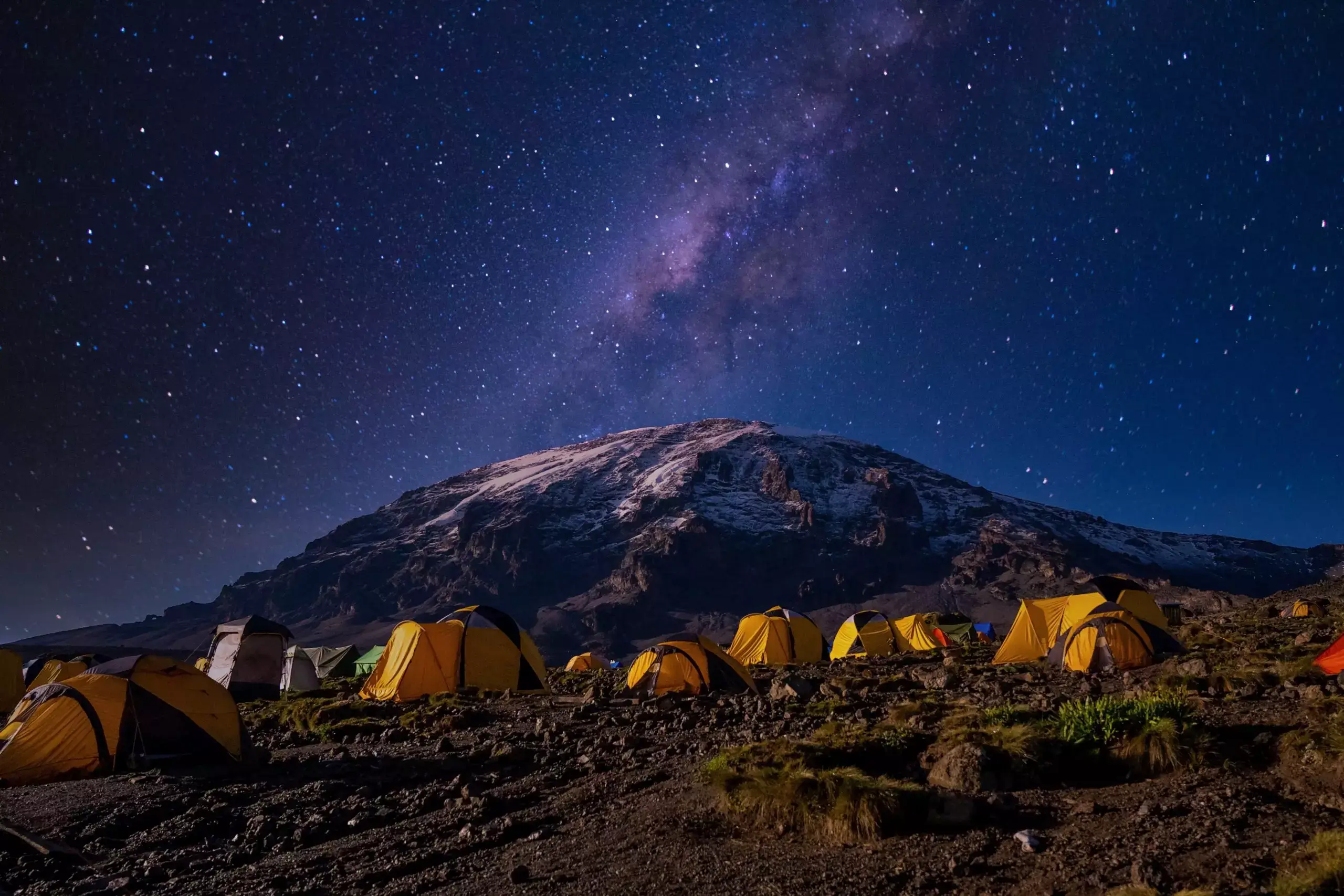 Beautiful scenery of yellow tents in the Kilimanjaro National Park