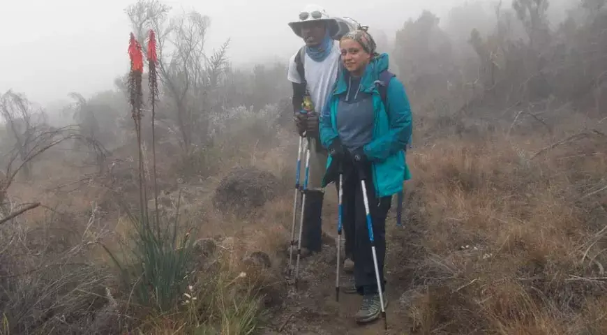 Dr. Anindita Bhateja along with trekking guide while hiking Kilimanjaro.